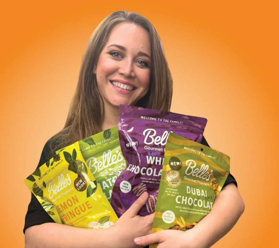 Belle's founder holding four flavors